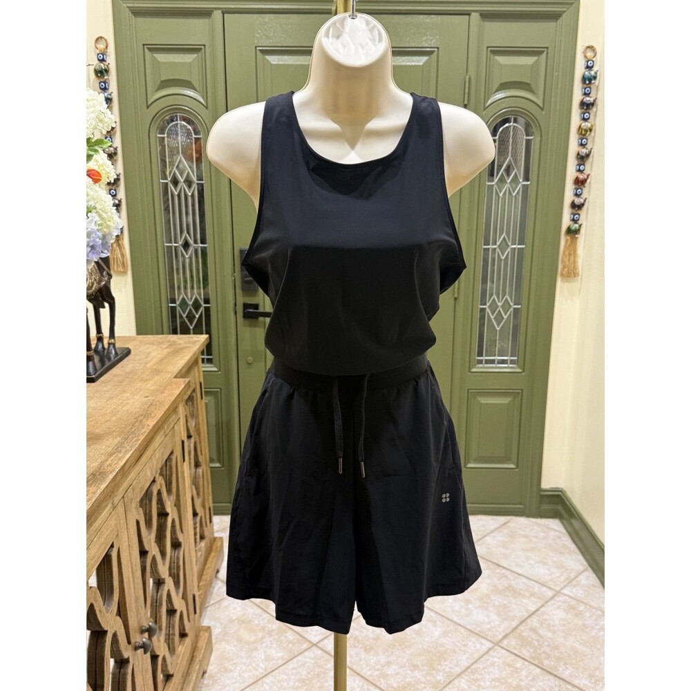 Sweaty betty explorer romper black size 4